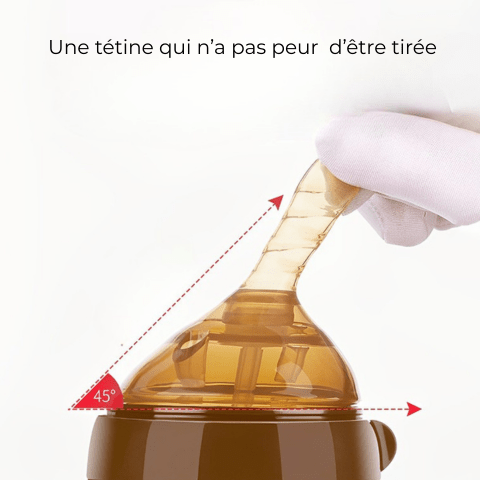 une tétine de biberon tirée pour montrer la résistance.