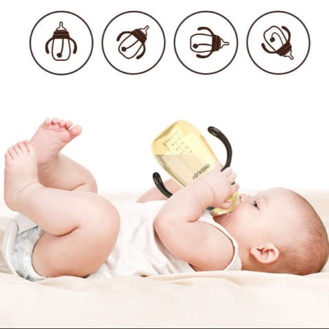 bébé allongé boit son lait 
